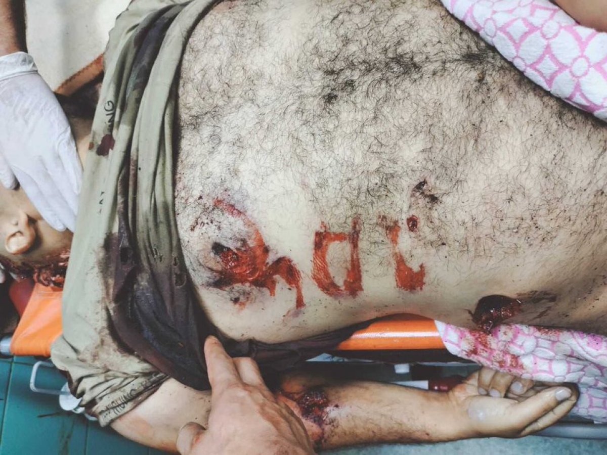 Israel killed a Palestinian in Jenin refugee camp, then mutilated his body. Then, the soldiers wrote in Hebrew "the end".