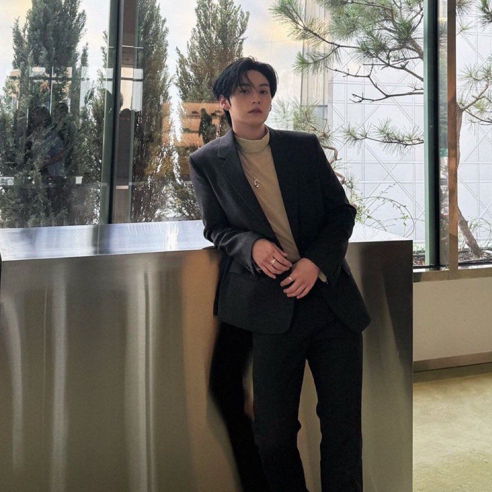 never put him in a black suit with a white button up again these colors are Perfect for his skin tone