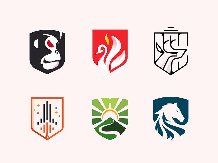 Which of these rad shield logos by <a href="/dainogodsgn/">DAINOGO .</a> takes the crown in your opinion?