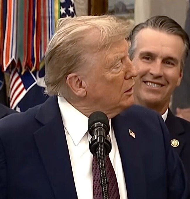 Find someone who looks at you the way who ever the fuck this guy is, who’s looking at President Stupid.