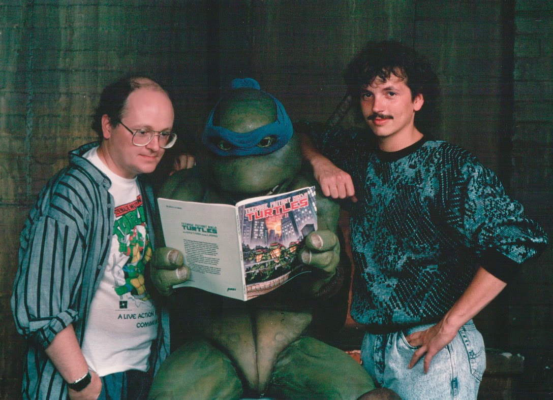 Teenage Mutant Ninja Turtles co-creators Kevin Eastman and Peter Laird hanging out with Leonardo on the set of the original 1990 Ninja Turtles movie