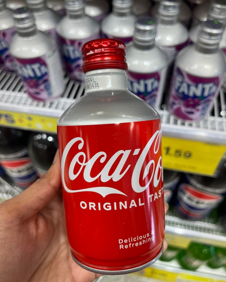 We've never see Coca Cola in a bottle this shape before!