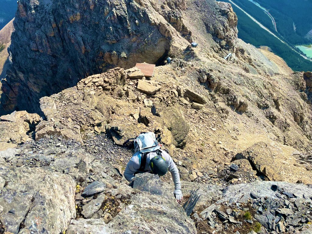 Simon_JonesYYC's tweet photo. 3/There are two points requiring moderate/difficult scrambling through headwalls which lead to generally traversing left (West) and up more loose gullies. Near the top, there are avalanche control devices and 3 or 4 helicopter pads which signal you are getting close to the summit https://t.co/aGXKzLb6vq