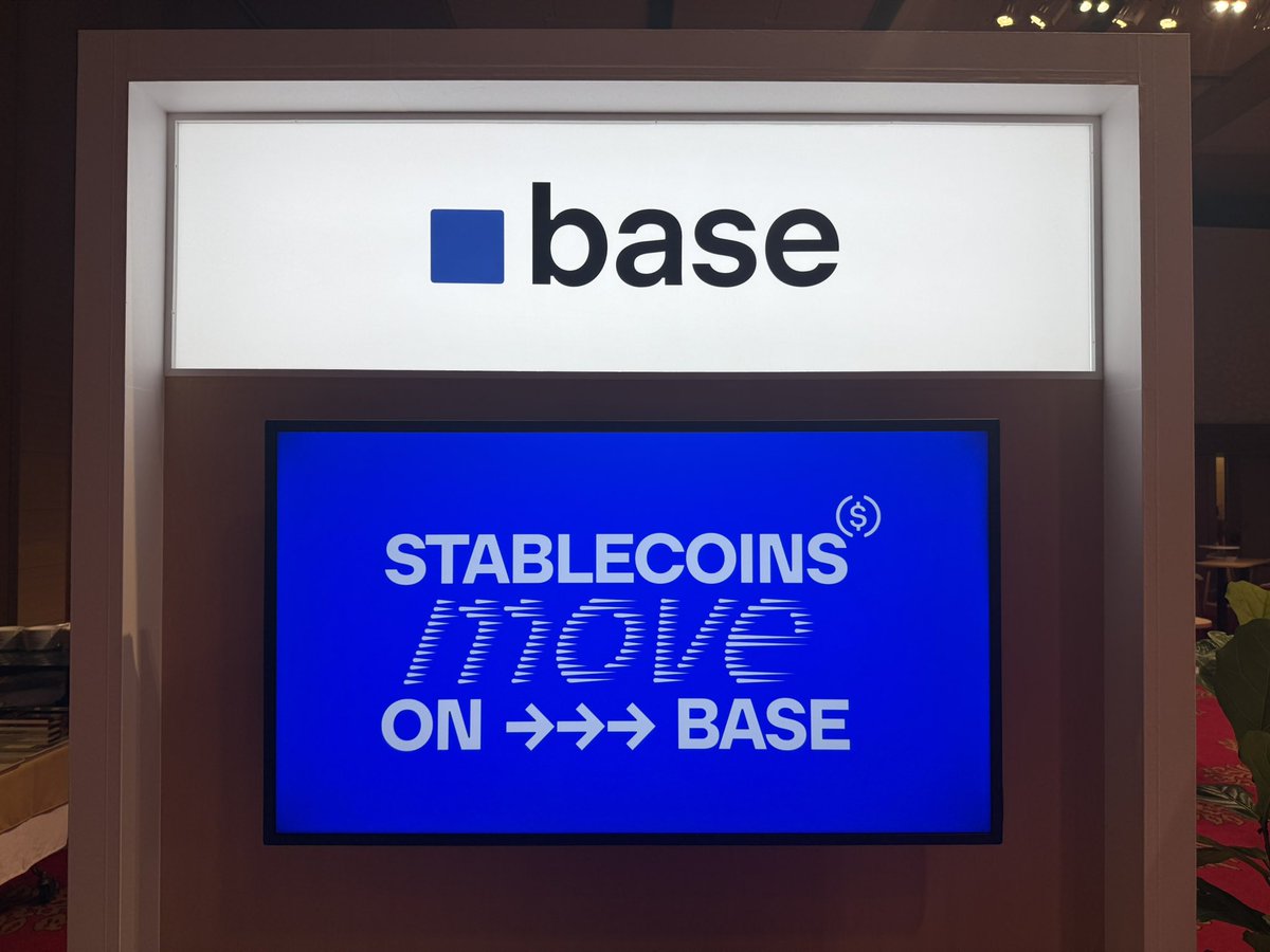 Base booth at Stripe Tours Tokyo displaying 'Stablecoins Move on Base'