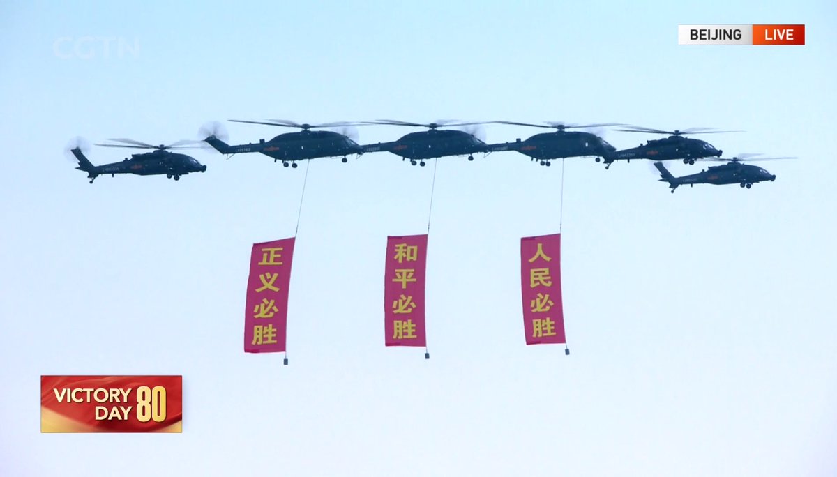 Helicopters with banners reading "Justice will prevail," "Peace will prevail" and "The people will prevail" fly over Beijing #VDay news.cgtn.com/news/2025-09-0…