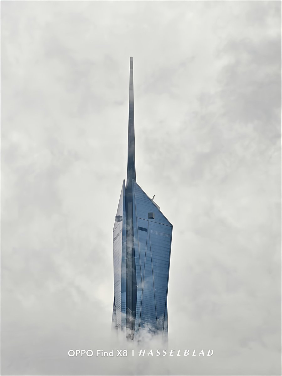 micuellis's tweet photo. Piercing the clouds, the Merdeka 118 ☁️—a breathtaking architectural marvel.  The second tallest building in the world, captured in all its glory.  This stunning shot showcases the power of OPPO Find X8's Hasselblad camera.  Truly a sight to behold! 🤩 
 #ShotonOPPO @oppo https://t.co/5tqkvPdGnU