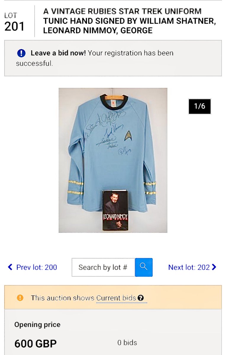 A vintage Rubies Star Trek uniform tunic hand signed by William Shatner, Leonard Nimmoy,George Takei, Walter Koenig and Nichelle Nichols. Size medium. And a signed copy of 'I am Spok' by Leonard Nimmoy. Condition report: no issues.Coming up for Auction on 5th Sept 25 at Bentleys
