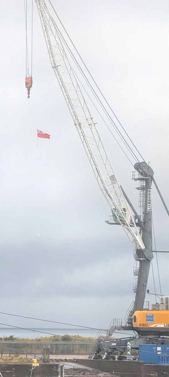 Today marks Merchant Navy Day. The Port has shown it's support by flying the #RedEnsign on the Liebherr crane. #MerchantNavyDay