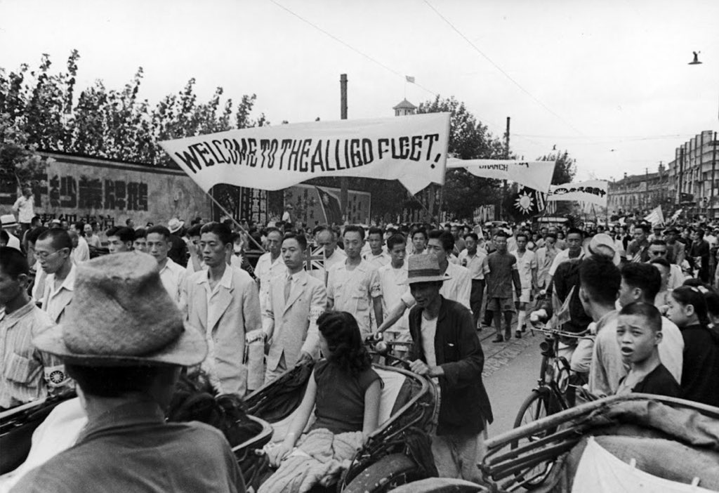 HistoricSH's tweet photo. As China commemorates the 80th anniversary of VJ Day, we look back 80 years at a Shanghai celebrating the end of the long war and occupation with Greg Lacks’ photos. #vjday https://t.co/veBmRmlpwd