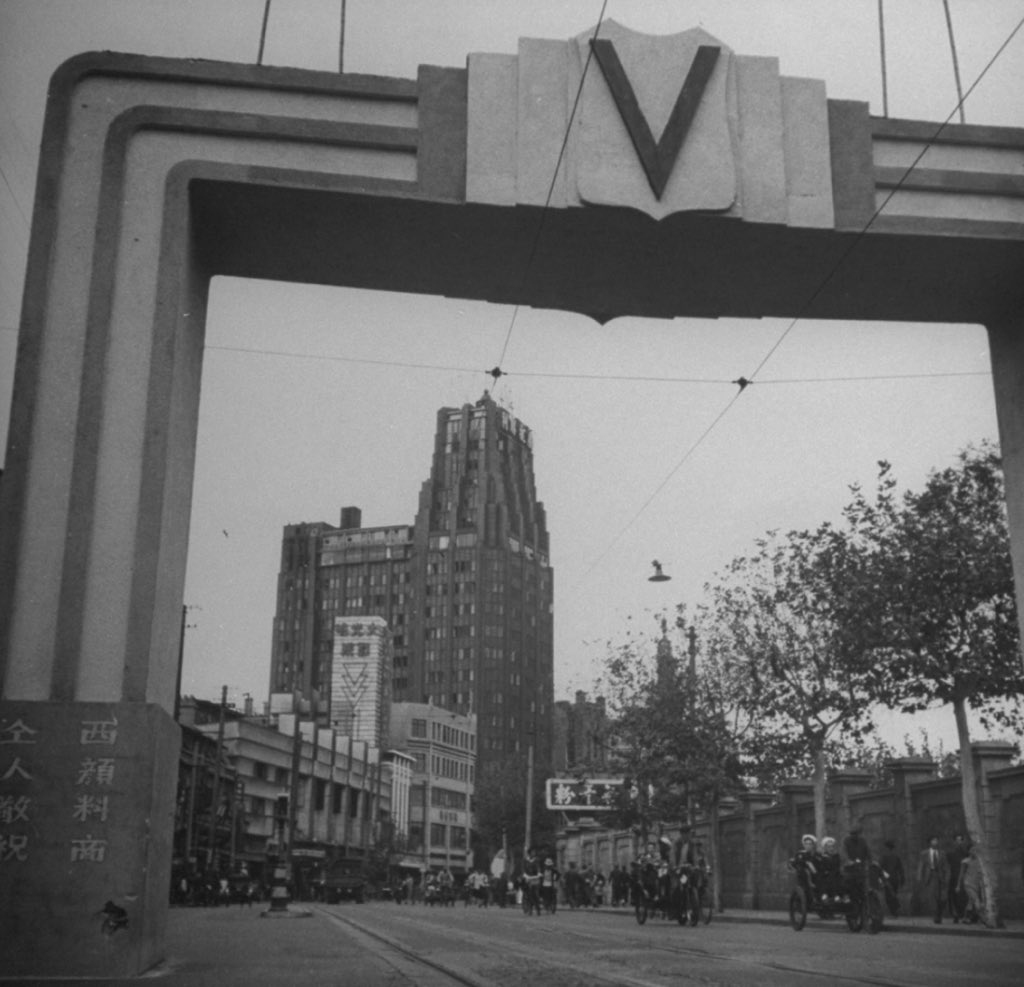 HistoricSH's tweet photo. As China commemorates the 80th anniversary of VJ Day, we look back 80 years at a Shanghai celebrating the end of the long war and occupation with Greg Lacks’ photos. #vjday https://t.co/veBmRmlpwd