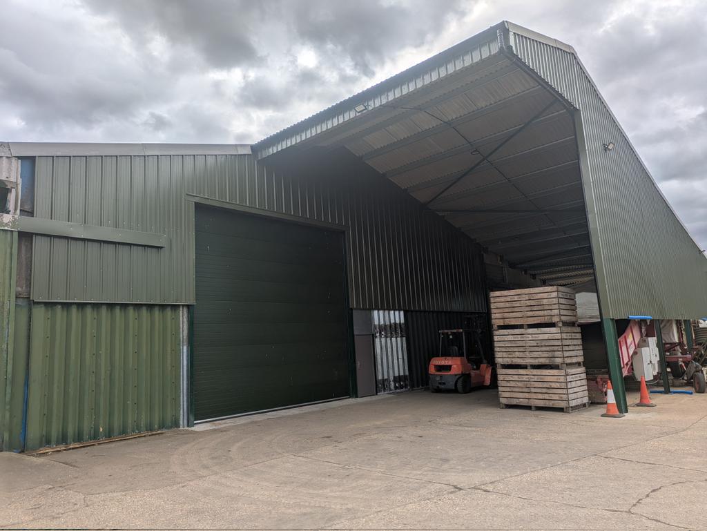 Recent door relocation and reclad with insulated panels