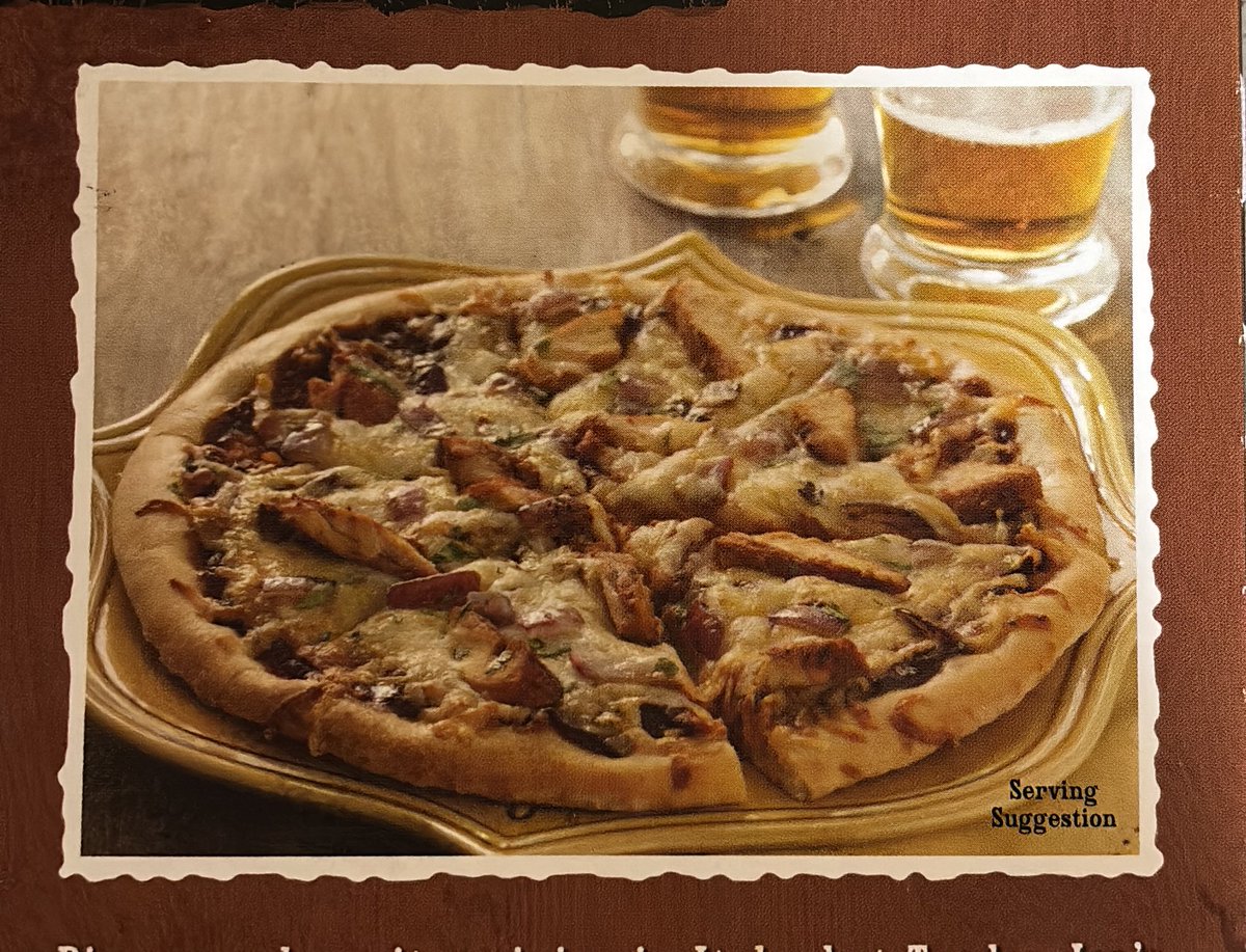 TJRIV's tweet photo. I love that the serving suggestion of the Trader Joe’s BBQ chicken pizza is a couple of brew dogs. https://t.co/wgbizkPHYv