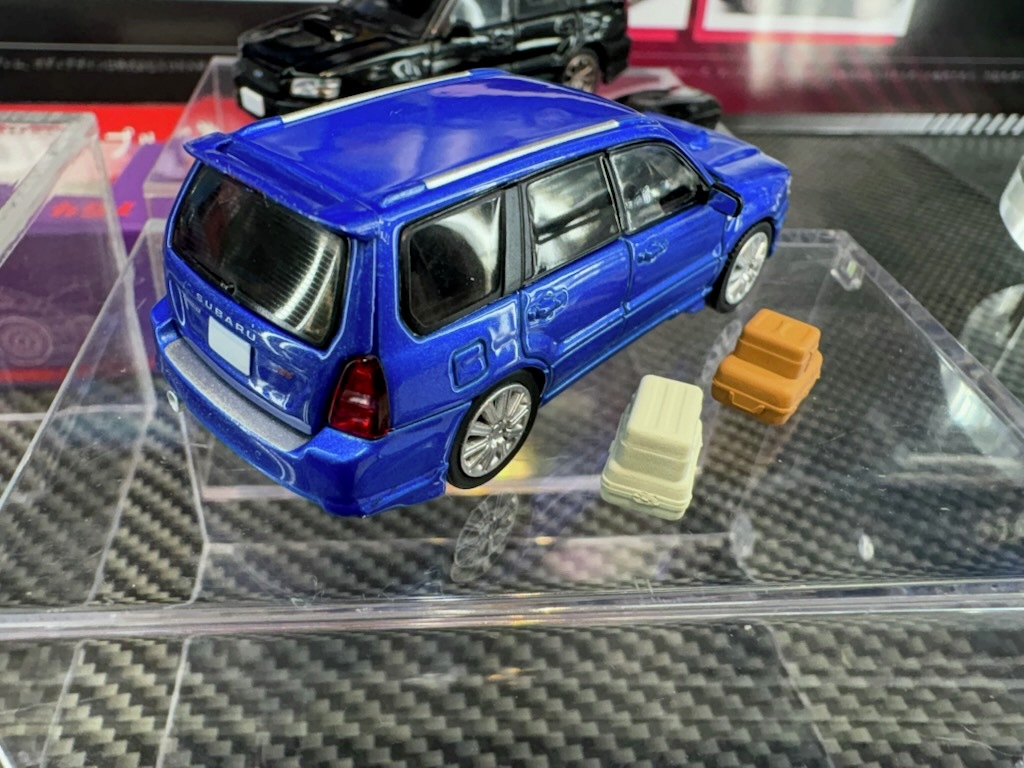 joshin_skl's tweet image. ホビージャパンが展開する新ブランド「 MODEL MODEL」から １２月頃発売予定の1/64 スバル フォレスター SG9 Stiのサンプルが届きました！開閉可能なトランクと小物が付属、ホイールもStiバージョンとなっています。その他にも多数の発売前の新製品を展示しておりますので、ぜひ間近でご覧ください！