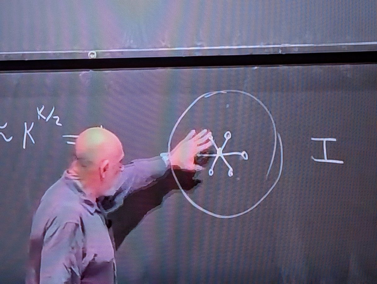 Lenny Susskind came up with the Claude butthole logo