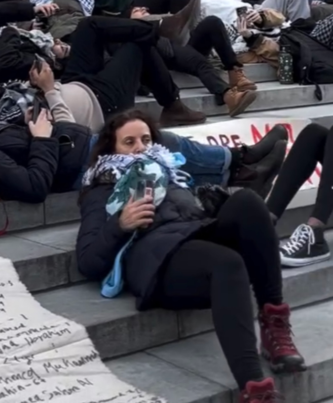 🚨 Professor Karameh Kuemmerle, Neurology, Harvard University, and a pediatrician at Boston Children's Hospital (holy smokes).

At the "Emergency Die-In for Gaza" on campus, she pretended to play dead, then chanted for the downfall of Israel. Lol, weirdo. 

She's still employed.
