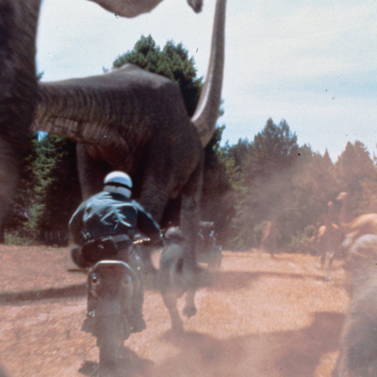 *Mamenchisaurus and Motorcycle noises*

Check out this publicity shot of an InGen Hunter on the Isla Sorna Game Trail from The Lost World Jurassic Park!

If you own any JP related Slides, please reach out!! We would be interested in scanning it for free!
