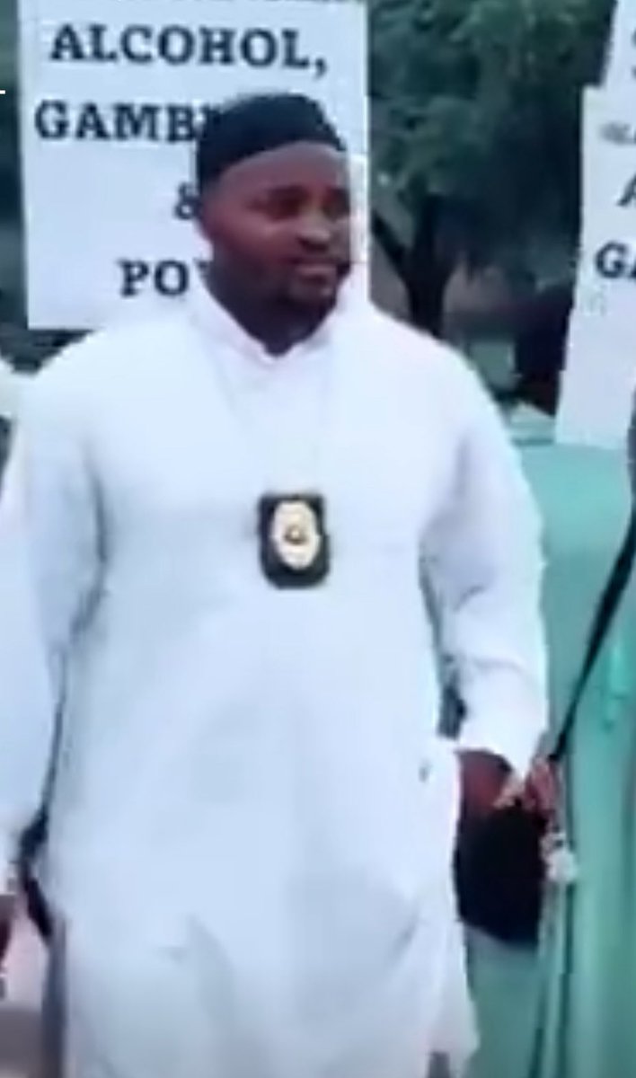 Amy Mek (@amymek) on Twitter photo Alert 👉 <a href="/houstonpolice/">Houston Police</a> — can you confirm if this man, seen marching with a Sharia patrol and wearing a badge, is an HPD officer? Alert 👉 <a href="/houstonpolice/">Houston Police</a> — can you confirm if this man, seen marching with a Sharia patrol and wearing a badge, is an HPD officer?
