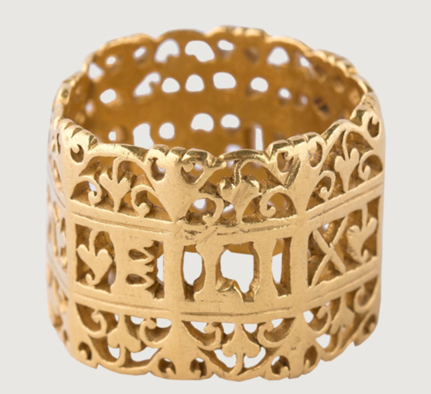 Openwork finger ring with the motto “VTERE FELIX” meaning (“use (this) happily.”)  Culture: Roman; Date: 3rd century AD; Medium: gold.