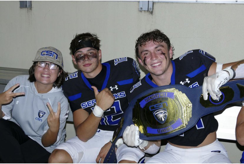 <a href="/coachpaytong/">Payton Gibbs</a> helping break out the Turnover belt last night after <a href="/caleaustinqb/">cale austin #2</a> 1st INT for our defense this season #HAVOC 🦅🦅🦅