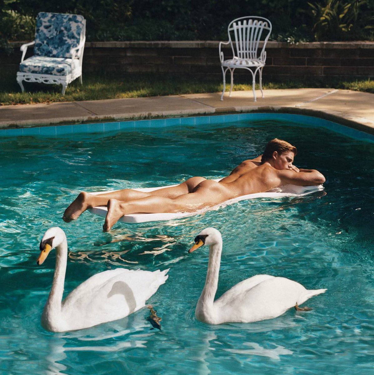 Pool time with friends, Santa Barbara, California, 2001. By Bruce Weber.