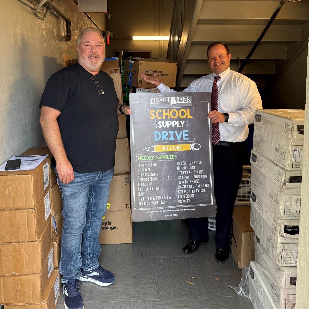 A huge Thank You to the owners of Alabama Campers (pictured here with Bryant Banker Max Karrh, who went above and beyond with an amazing donation of over $2,000 worth of school supplies to Tuscaloosa's Alberta School of Performing Arts!