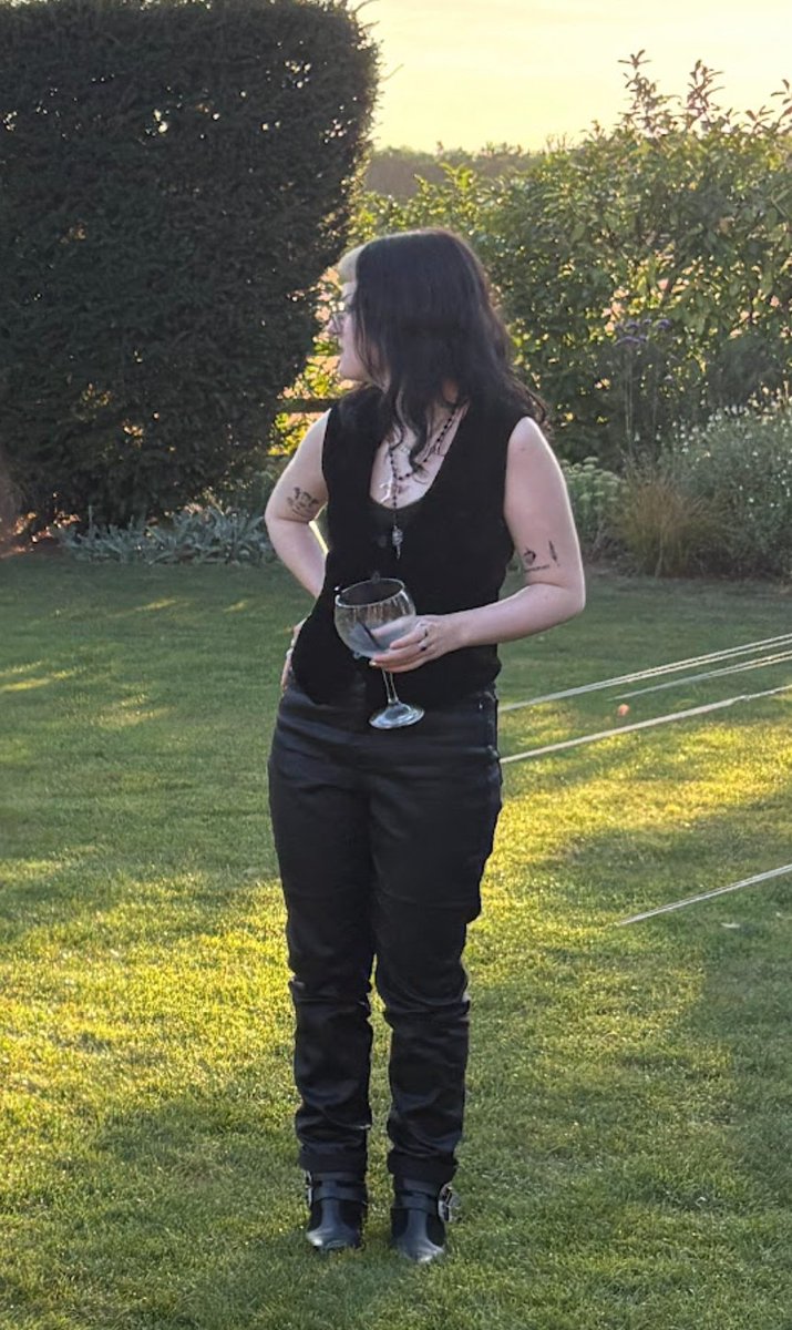 got papped at my friend's wedding and i look like someone's alcoholic goth aunt