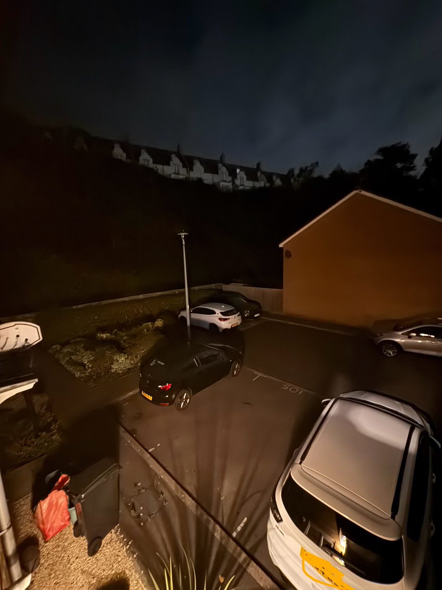 Mattylennon97's tweet photo. @NorthSomersetC  at it again. CUTS CUTS CUTS. Absolutely disgusting that I can’t even walk out the front door and see a thing. This light only up to recently would be on all night. Why turn off out streetlights. How’s this safe ? The second photo is with night filter https://t.co/1hRmVgbhVn