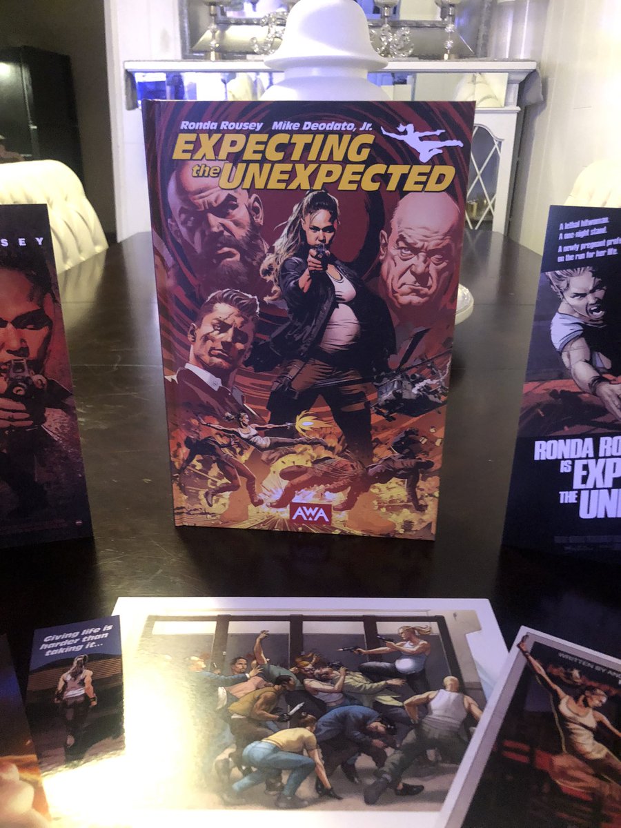 8navyblue's tweet photo. Yes! I love my hardcover graphic novel - Perfection!! I'm a happy comic book/graphic novel fan! @RondaRousey @mikedeodato @AWA_Studios #ExpectingTheUnexpected https://t.co/8BTH1g25qL