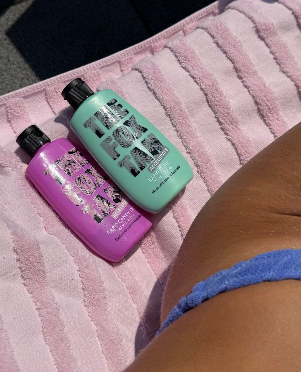 Our girl @michellemazul turning up the HEAT 🔥⁠
Her tanning sesh = powered by the Candy Crush Duo (Rapid Candy Oil + Rapid Elixir) 🍭☀️⁠
Name a pair more iconic… we’ll wait. 💅🏼⁠
⁠