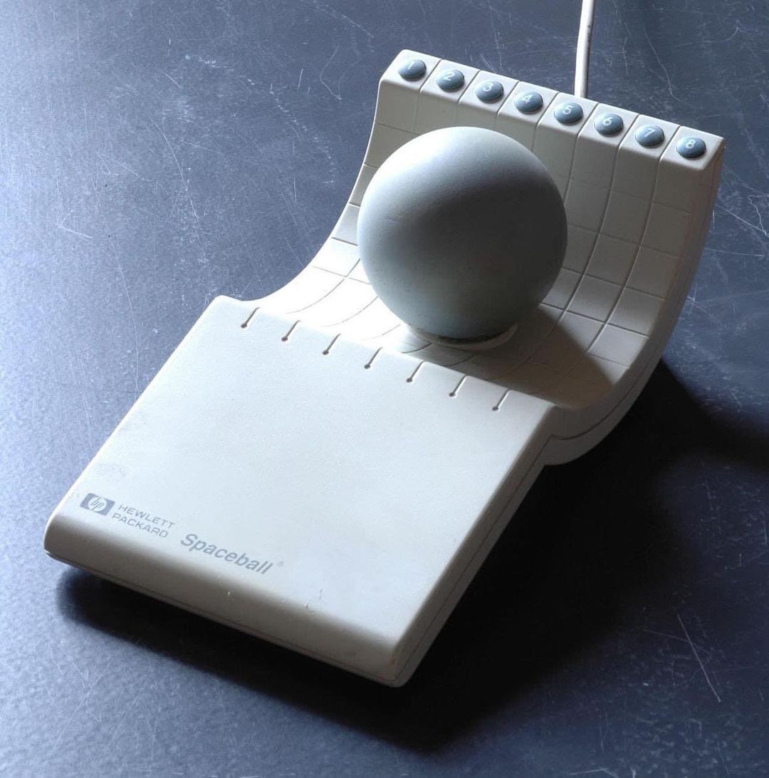 HP Spaceball 2003 (1991). While the mouse operates on X and Y axes, the HP Spaceball also used the Z axis, making it easy to rotate objects in 3D space. Plus the white plastic made it look like something out of 2001: A Space Odyssey.