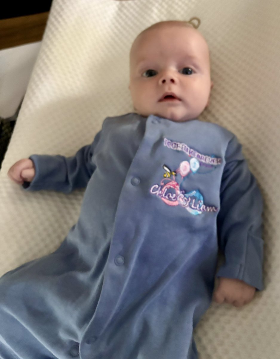 Our beautiful Grandson Rowan in his Chloe &amp; Liam Together Forever Trust baby grow 🩷💙