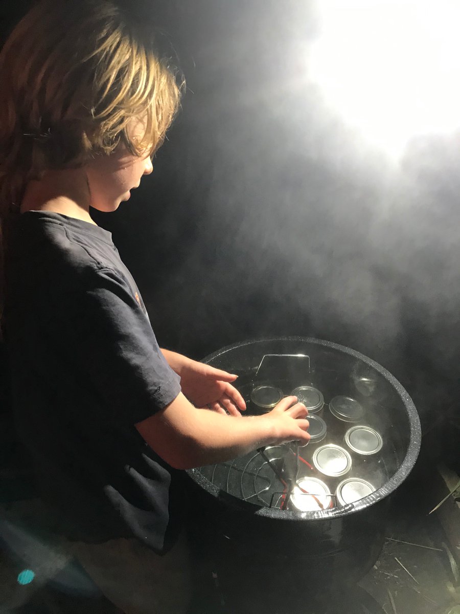 Canning salsa in the dark on the back porch is how we do August.