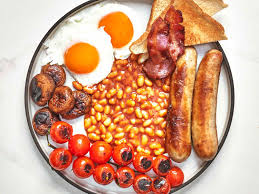 Achtung. 
Since it is a arrestable offense too say "Bacon" in United Kingdom this week, can we go with "Full English Breakfast" ? It's even comes with "Pork" and beans. Fight on and Cheers.