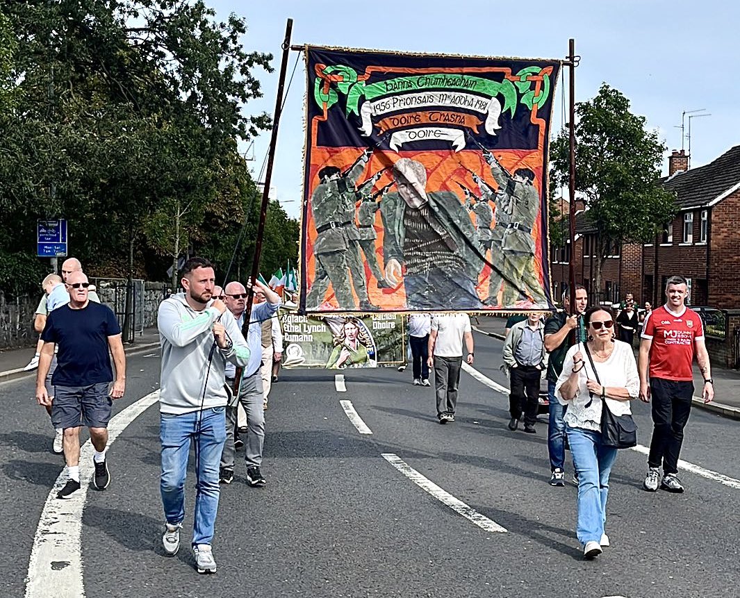 A banner depicting armed IRA terrorists was displayed in Belfast this afternoon. 
This banner is illegal and contravenes Parades Commission regulations. 
Will it make headlines in  <a href="/BelTel/">Belfast Telegraph</a> tomorrow? 
Will <a href="/StephenNolan/">Stephen Nolan</a> or <a href="/BBCTalkback/">BBC Talkback</a> highlight the offence?