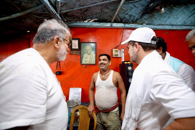 Tushar Gandhi and Rahul Gandhi visited Apna Dhaba, located between the Purnea and Araria districts, and met with the dhaba owner during the #VoterAdhikarYatra in #Bihar. A portrait of #MahatmaGandhi, the Father of the Nation, hangs prominently on the dhaba wall.