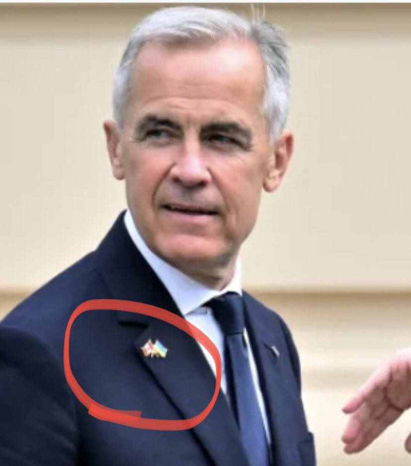 August 24, 2025.

First time in history that Mark Carney has been spotted wearing a Canadian flag pin—but only with a Ukrainian flag beside it.

Why won’t he JUST proudly wear only the Canadian flag?
🇨🇦🇺🇦