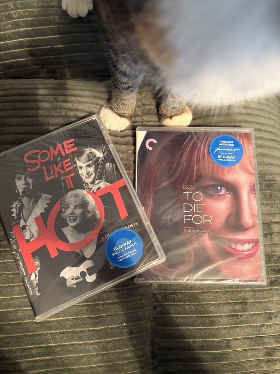 new additions to my dvd collection ft my cat’s paws 😭