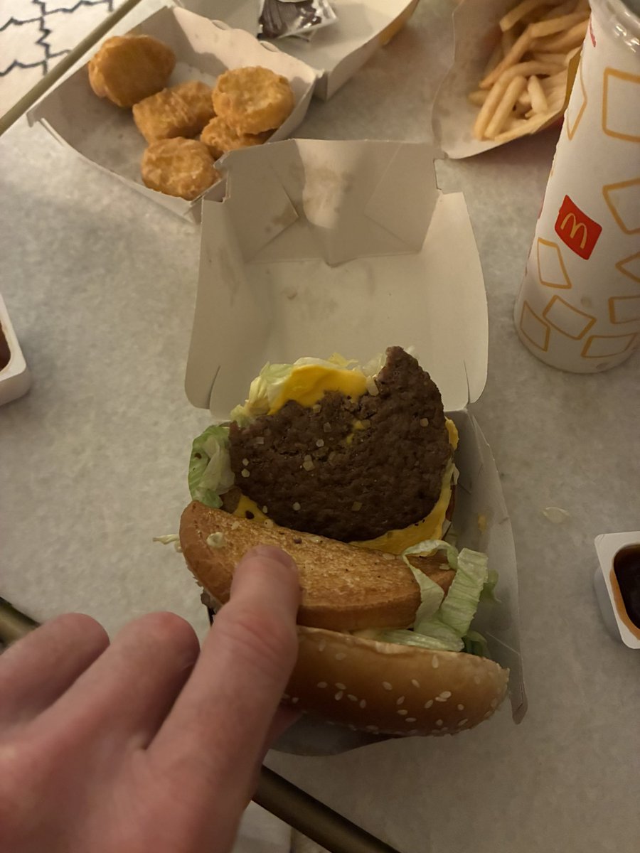I’m not loving it <a href="/McDonaldsUK/">McDonald's UK</a> - looks like someone had a nibble of my Big Mac before it arrived. It was also cold and soggy, but not sure if that’s you or <a href="/Uber/">Uber</a> - probably a sign to cook more.