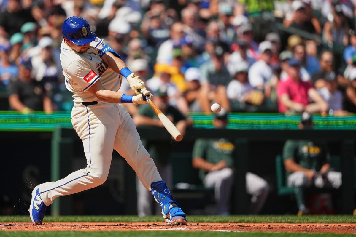lindseywasson's tweet image. No wait time for this one--after the tying HR in the 1st against the #Athletics, #Mariners' Cal Raleigh hits his 49th home run of the season in the 2nd to break the record for most single-season HRs by a catcher.  (AP/Lindsey Wasson)