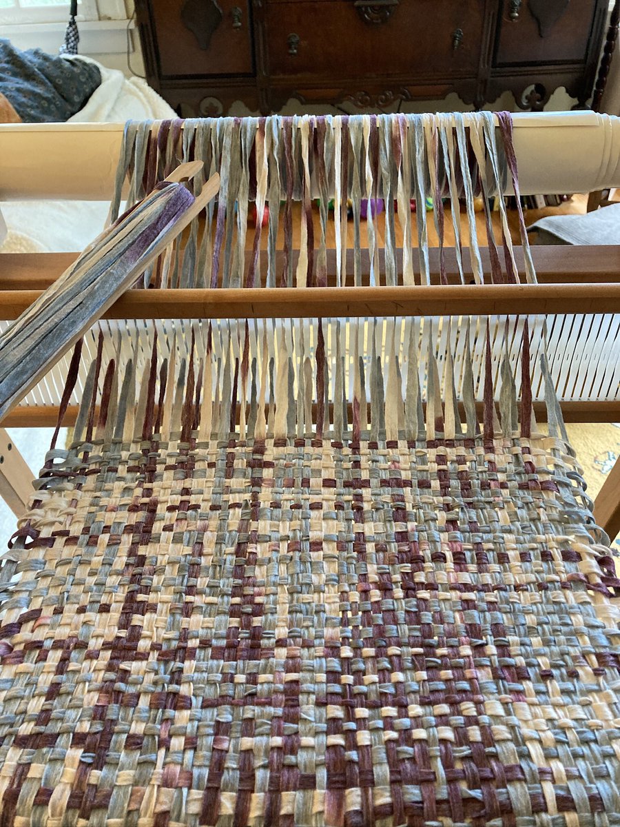 P_Hendrickson's tweet image. Took a break from writing today to start my sister’s birthday gift (it’s okay, she’s not on Twitter/X): a lightweight loose weave scarf made from @LionBrandYarn’s Rewind tape yarn. (You know I’ll inevitable write a script about weaving, right.) #scriptchat