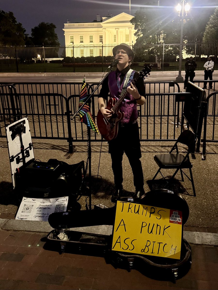 This man is currently singing anti-Trump songs with a "Trump's a punk-ass bitch" sign in front of the White House. There are federal troops all over the place yet he has not been arrested or executed.  Liberals, please explain how this is possible in Trump's fascist hellscape.