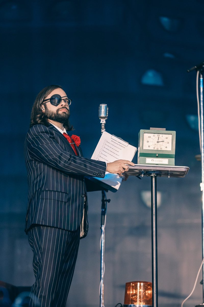 obsessed with how he purposefully shows the clipboard for just enough time to have someone in the audience snap a picture of it so everyone online could read what it says and decode meanings, Long Live The Black Parade tour is the world's most expensive ARG