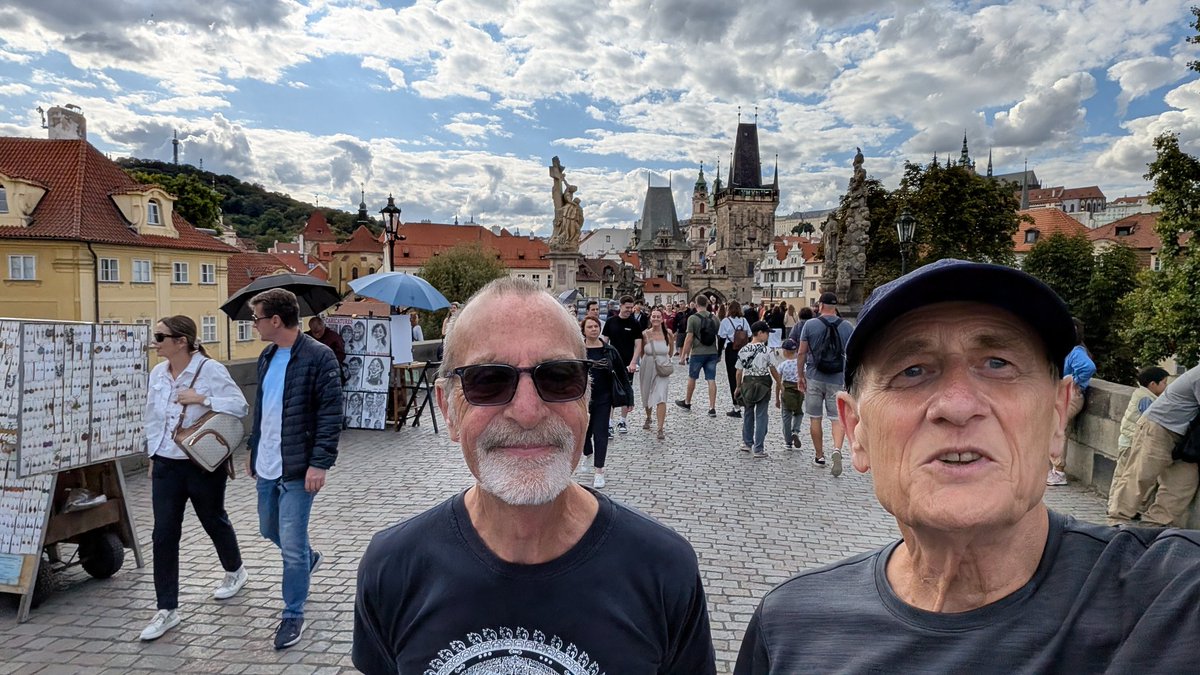 On Charles Bridge, Prague - with Strolling Steve Scott - part of a long trek of the city.