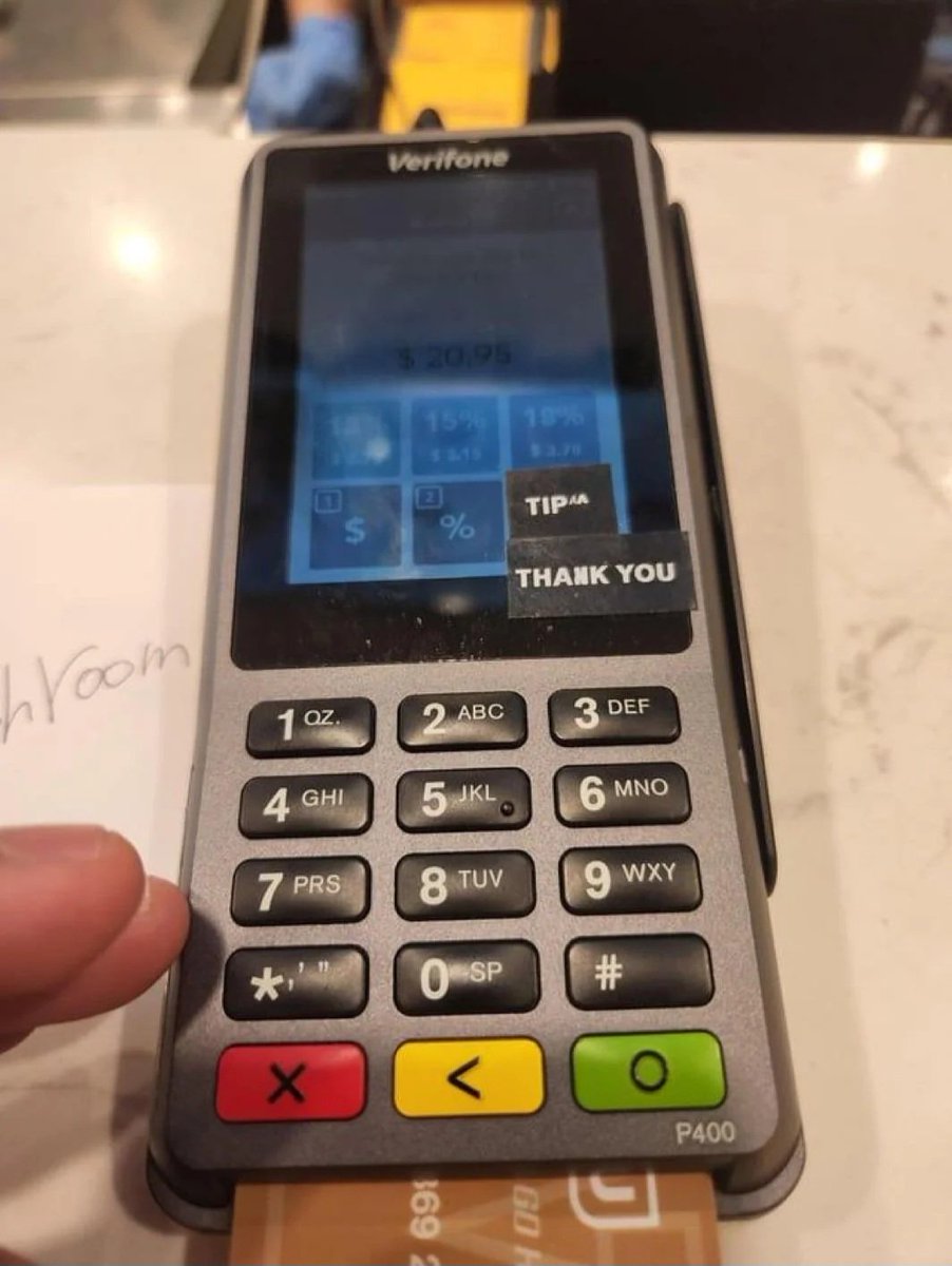 This restaurant covered up the "No Tip" option with a sticker to force tipping.

Tipping culture is out of control