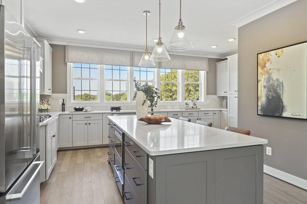 Persimmon – Main Living Level
📷 Life Happens Here
Open kitchen and family room with hardwood floors and natural light. Perfect for dinners, movie nights, and everyday life. #FairfaxCounty