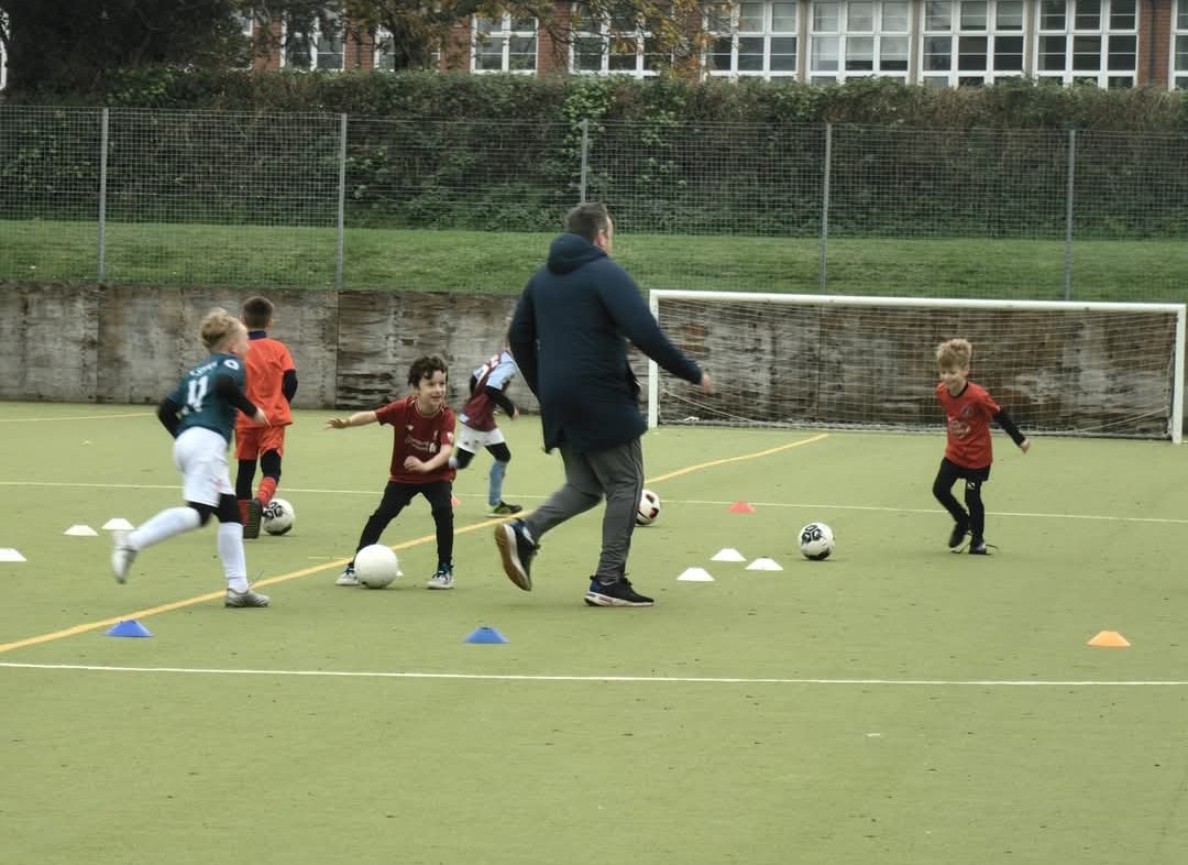 U7 football = touches + fun. Not tactical rondos