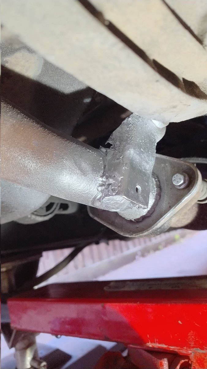 Didn't expect to have to do this today. Downpipe to gearbox support bracket had cracked and separated from the exhaust. Horrible rattle and extra strain on the remaining exhaust hangers so needed doing ASAP. Clarke's 130EN in fluxcore mode sorted it out. #bankholidaypeugeotrepair