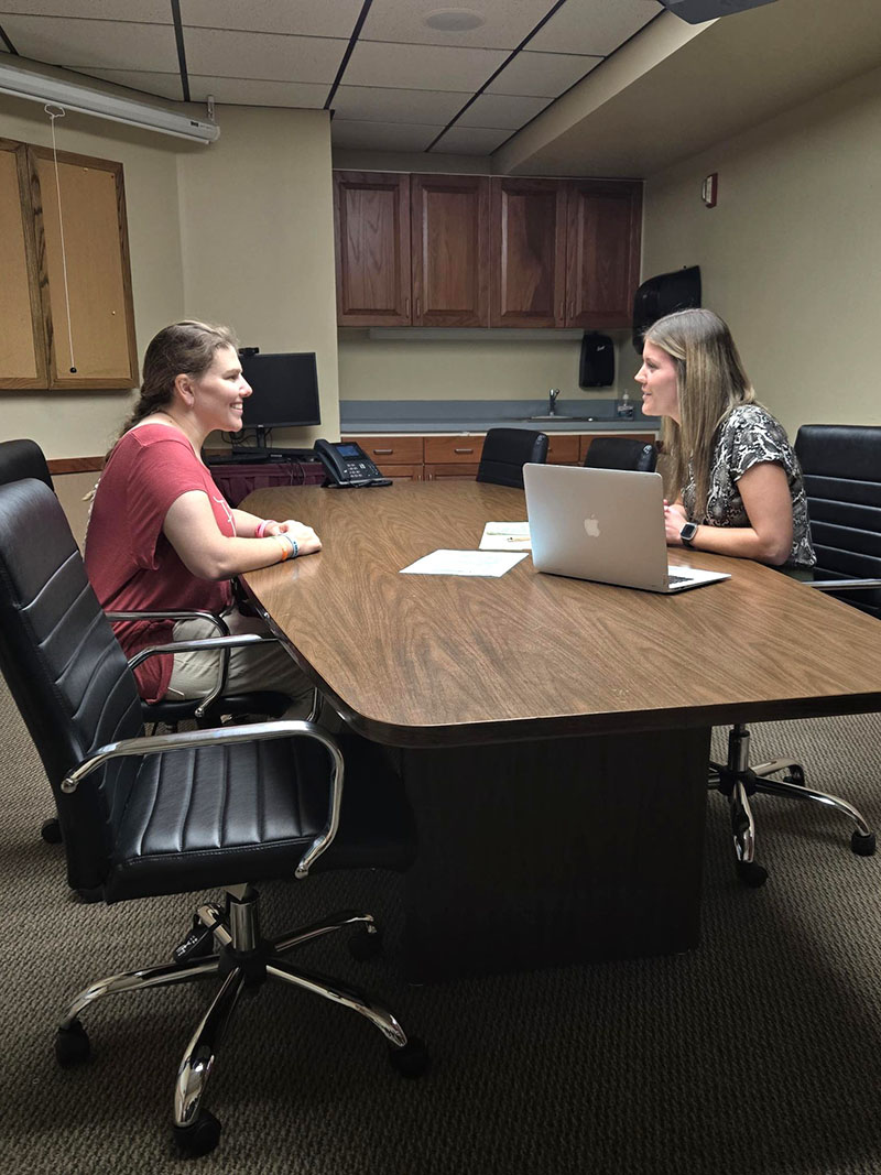 Every day, we break tasks into small, achievable steps. It takes practice to walk into a room, make an introduction and answer interview questions. Here, Paige May, Community Employment Specialist II, works with Kammi Bennett to build her skills for her ongoing job search.