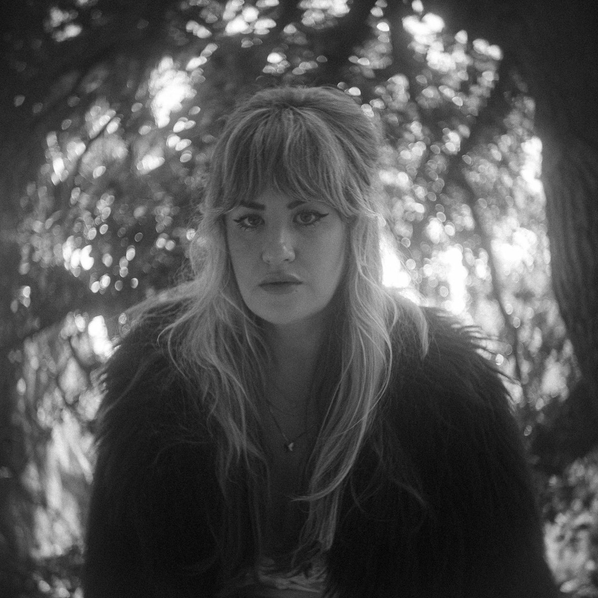 In my front yard, dressed like it’s winter, but it’s actually summer / photo by John Stavas