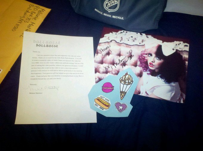 I found a picture of what you received if you donated to the Dollhouse music video :3